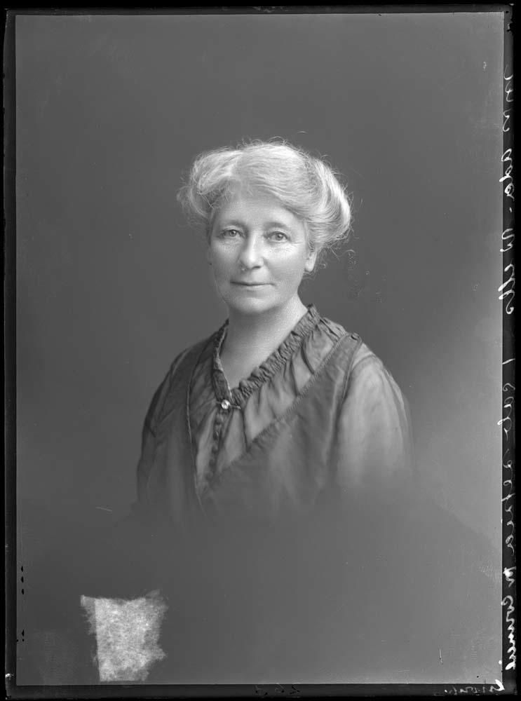 Ada Wells looks directly into the camera as she sits for a portrait.